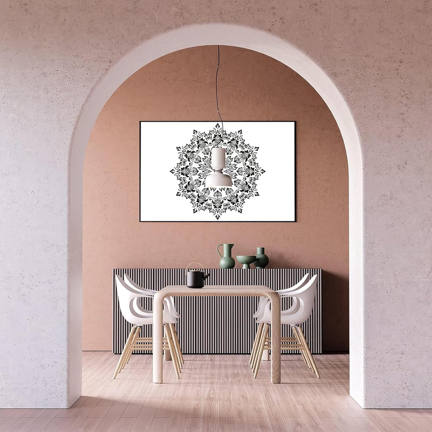 Dining room with a framed black and white abstract art piece on the wall.