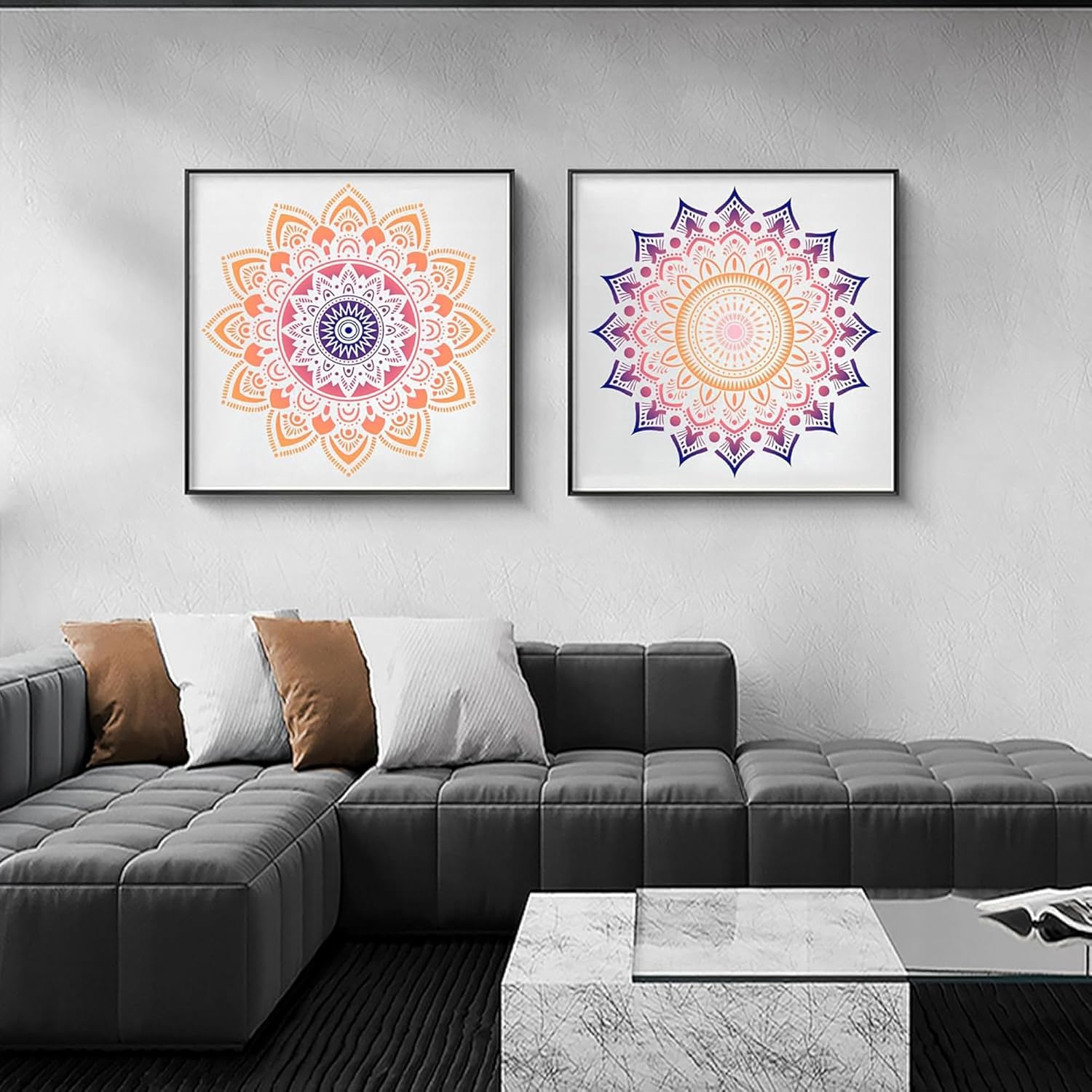 Two colorful mandala artworks on a gray wall above a gray sectional sofa.