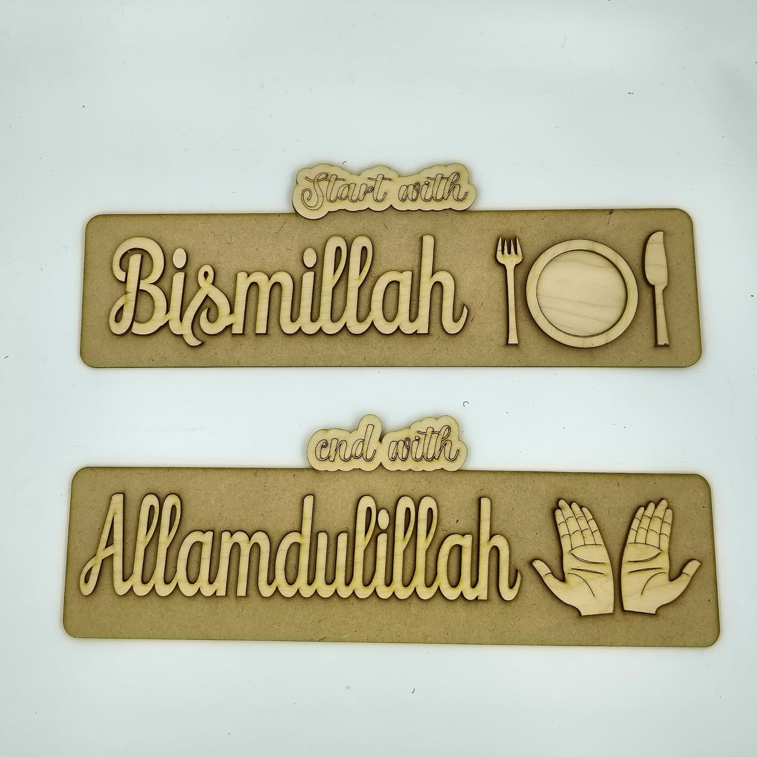 Two wooden signs with engraved text and symbols on a white background