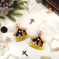 Decorative Christmas ornaments with nativity scene design on a white surface.