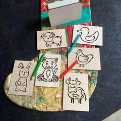 Set of animal stencils on a colorful fabric background