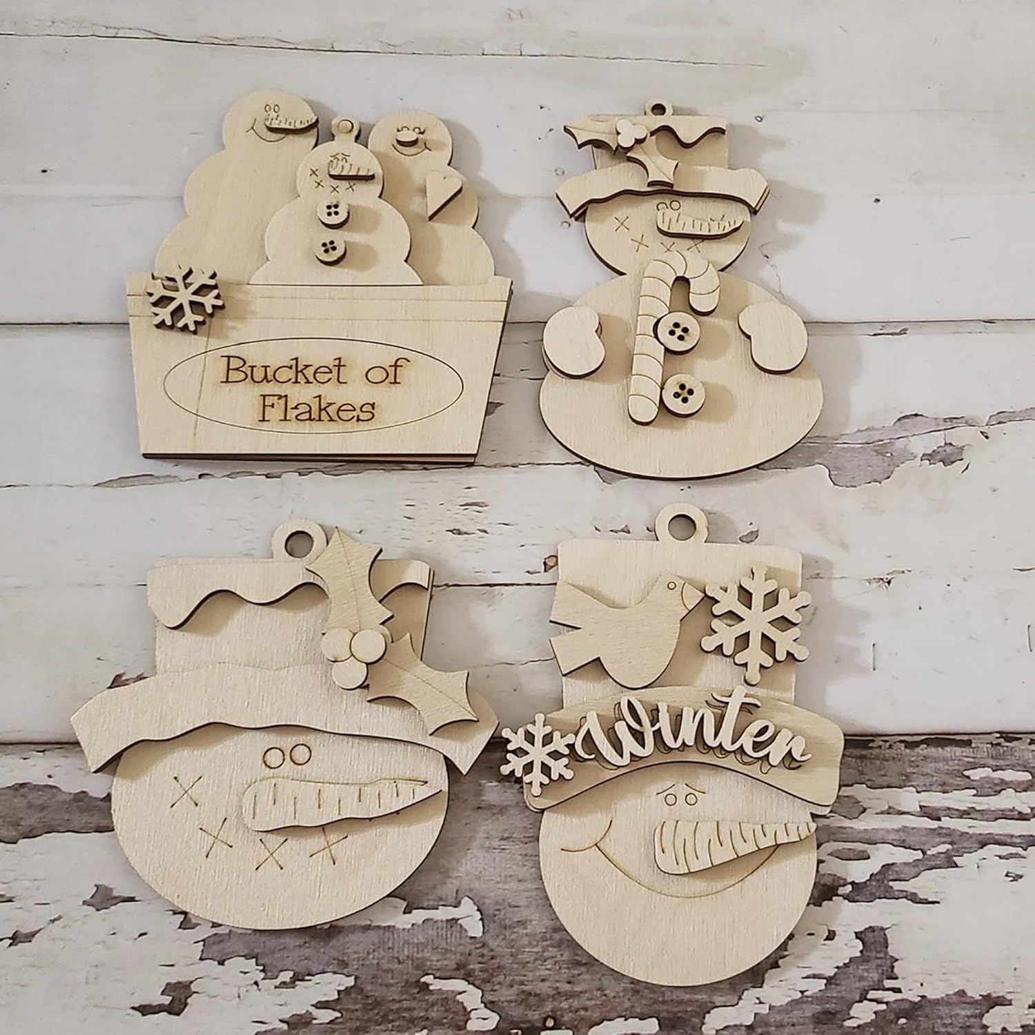 Set of wooden Christmas ornaments on a rustic wooden background