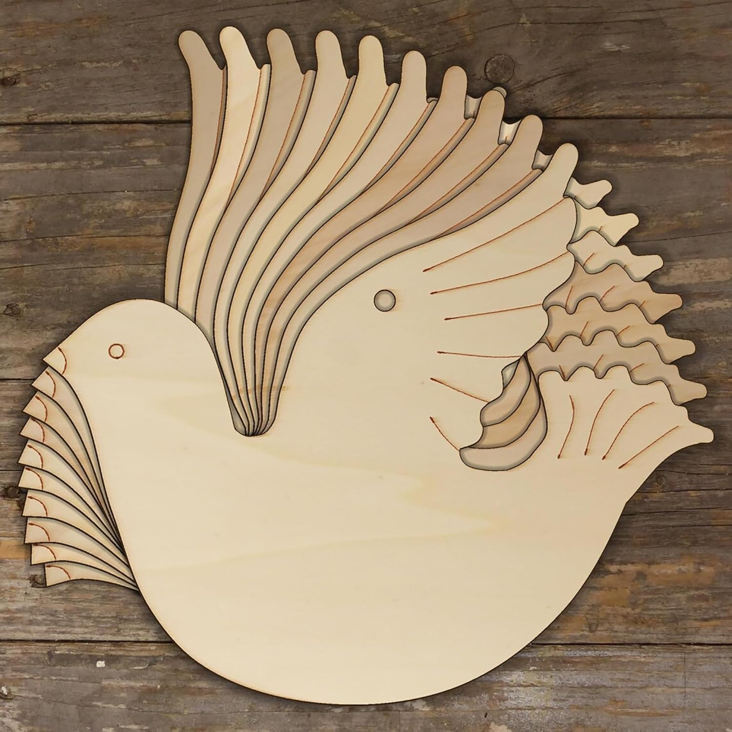Wooden dove cutout on a wooden background