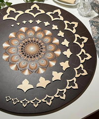 Decorative table mat with intricate patterns on a round table