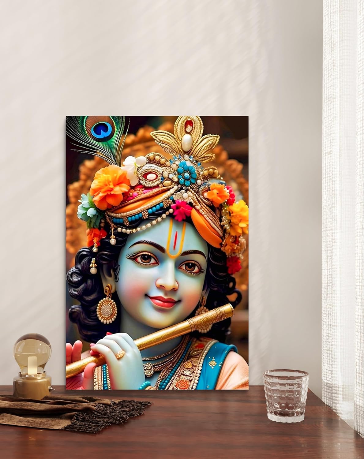 Decorative wall art of a神灵 figure with intricate jewelry on a wooden surface.