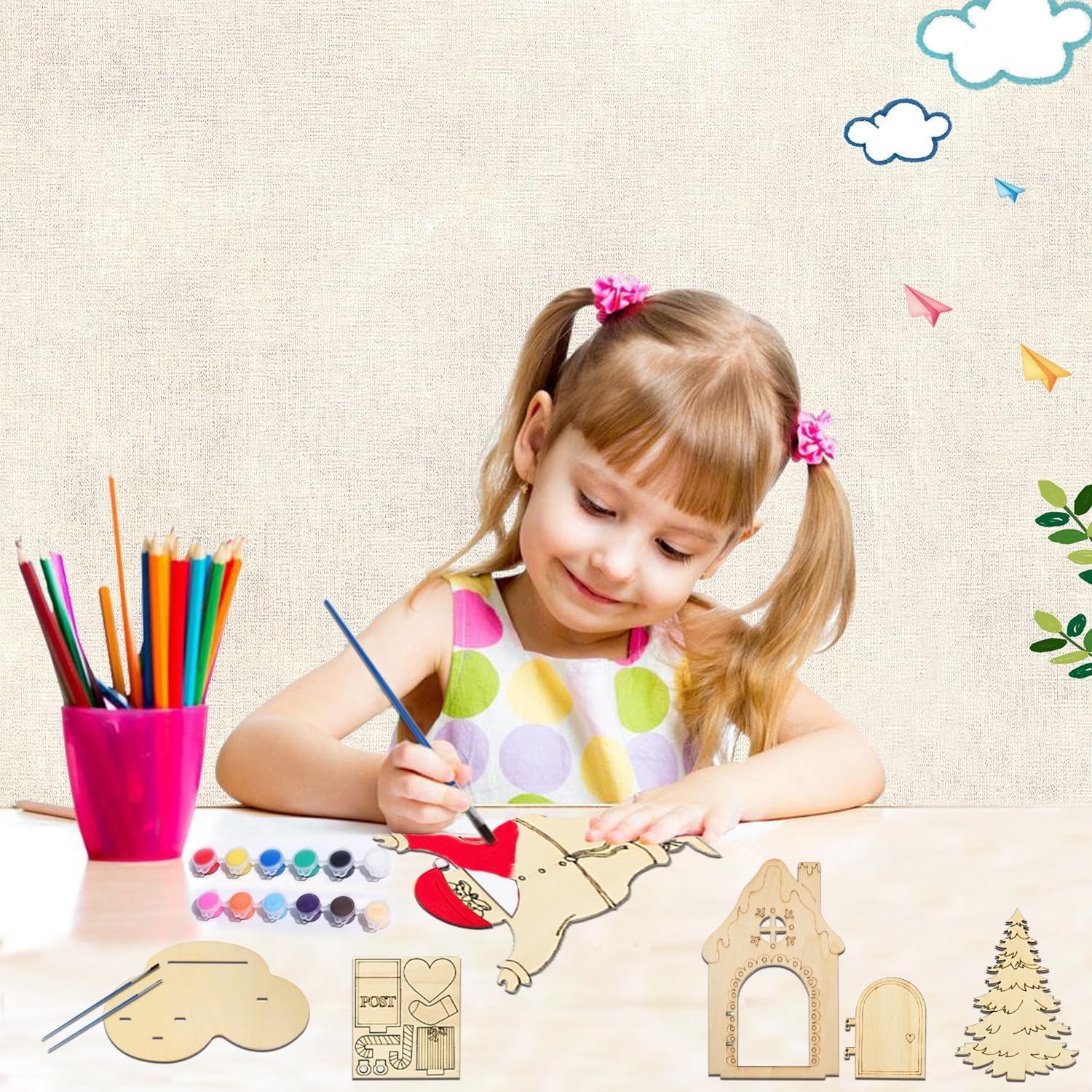 Child painting wooden crafts with colorful supplies on a table.