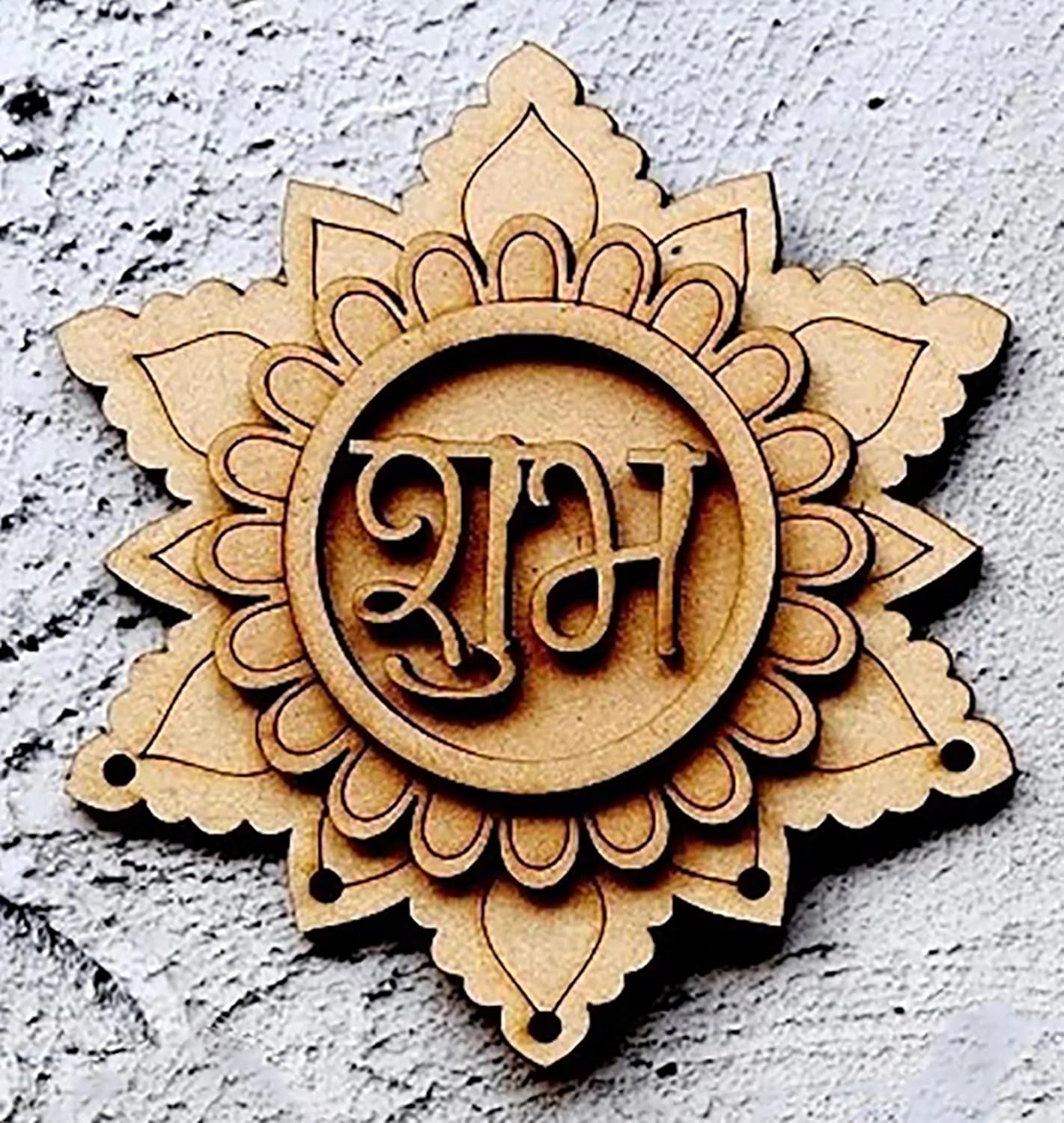 Wooden decorative item with intricate design and text on a textured surface
