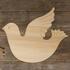 Wooden dove shape on a wooden background