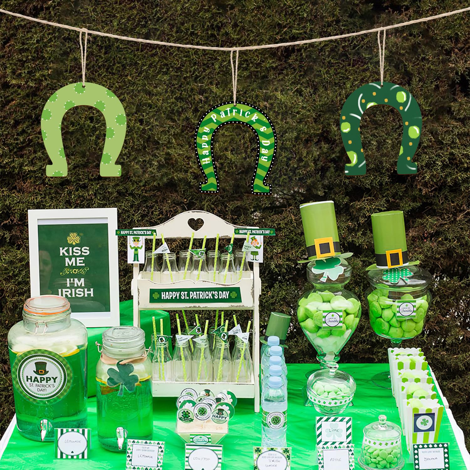 St. Patrick's Day-themed table setup with green decorations and treats.