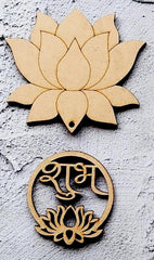 Wooden lotus flower and circular design with engraved text on a textured surface