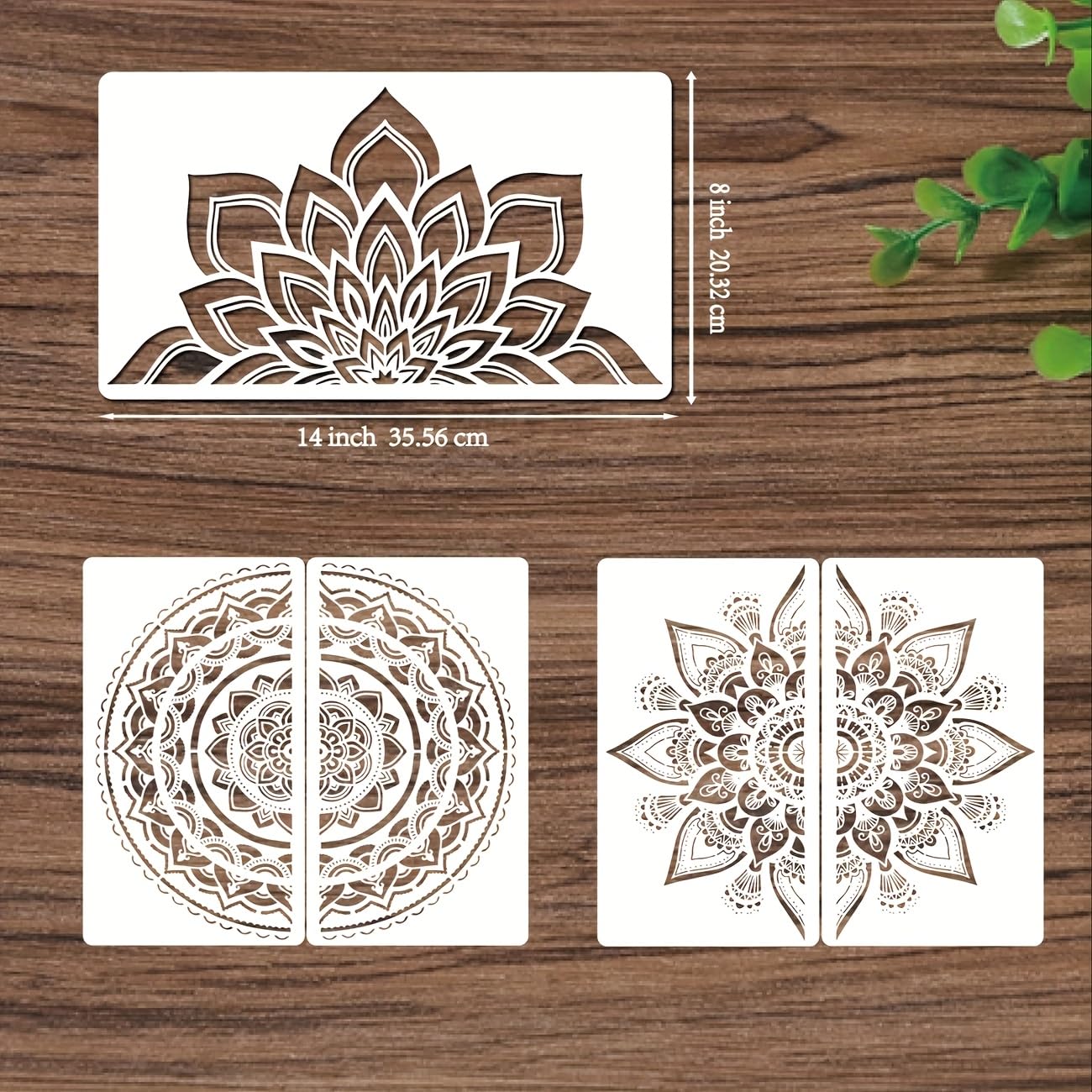Three mandala designs on white cards with measurements on a wooden surface.