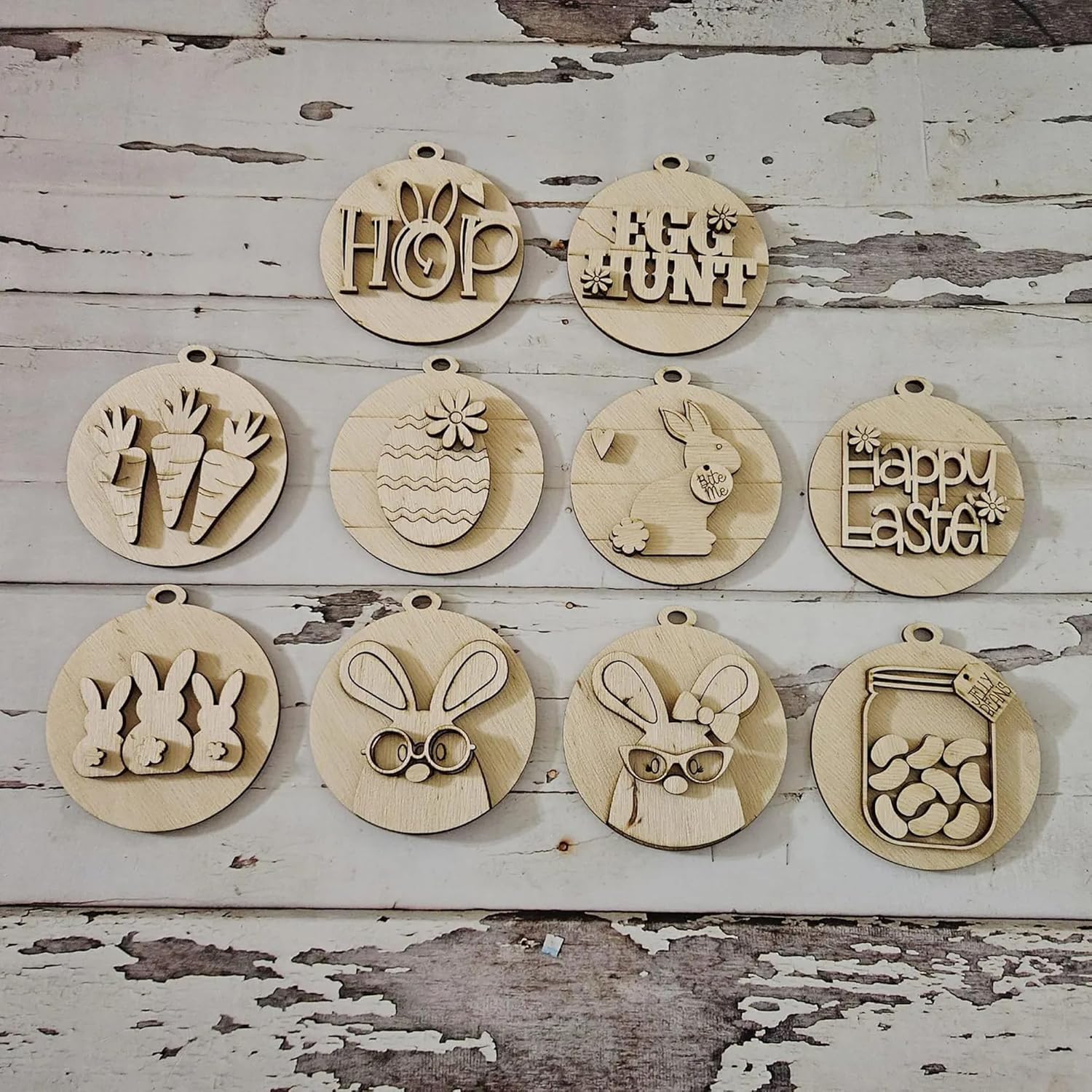 Set of wooden Easter-themed ornaments on a rustic wooden background