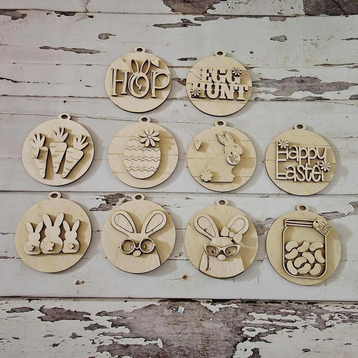 Set of wooden Easter-themed ornaments on a rustic wooden background