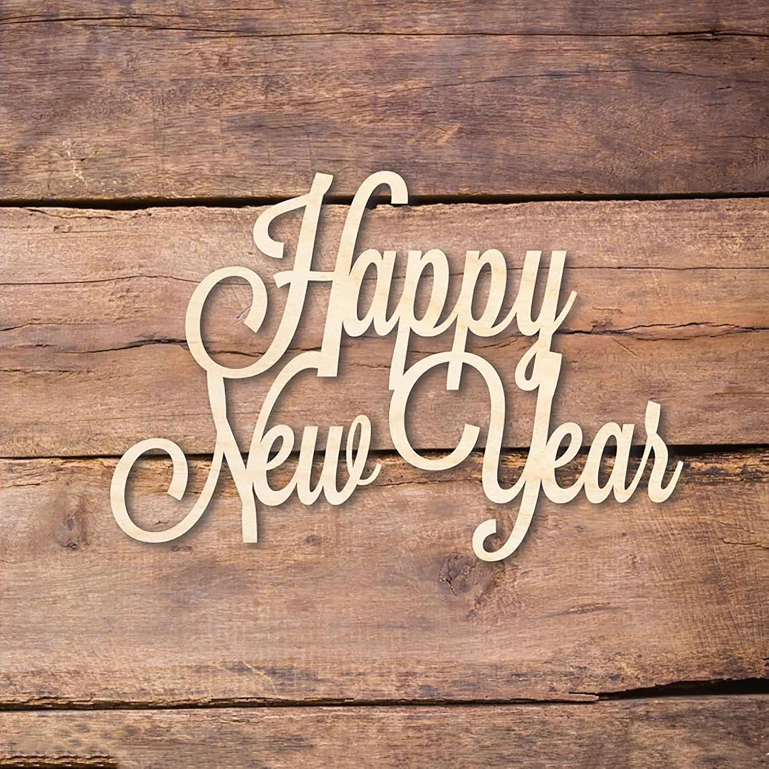 Wooden 'Happy New Year' decoration on a wooden background