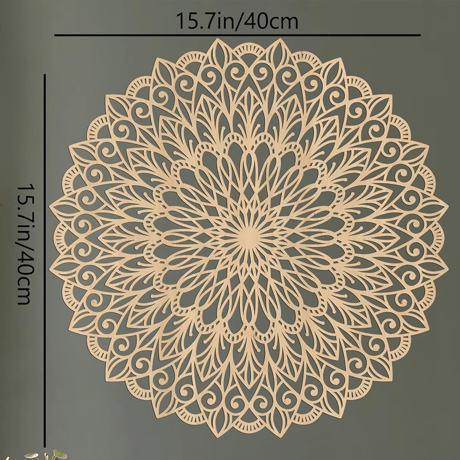 Decorative mandala design with dimensions on a gray background