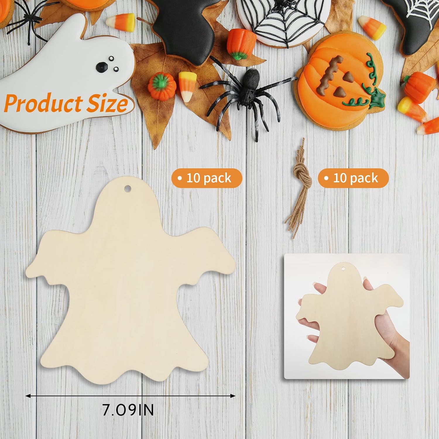 Halloween-themed decorations with a ghost-shaped cutout on a wooden surface.