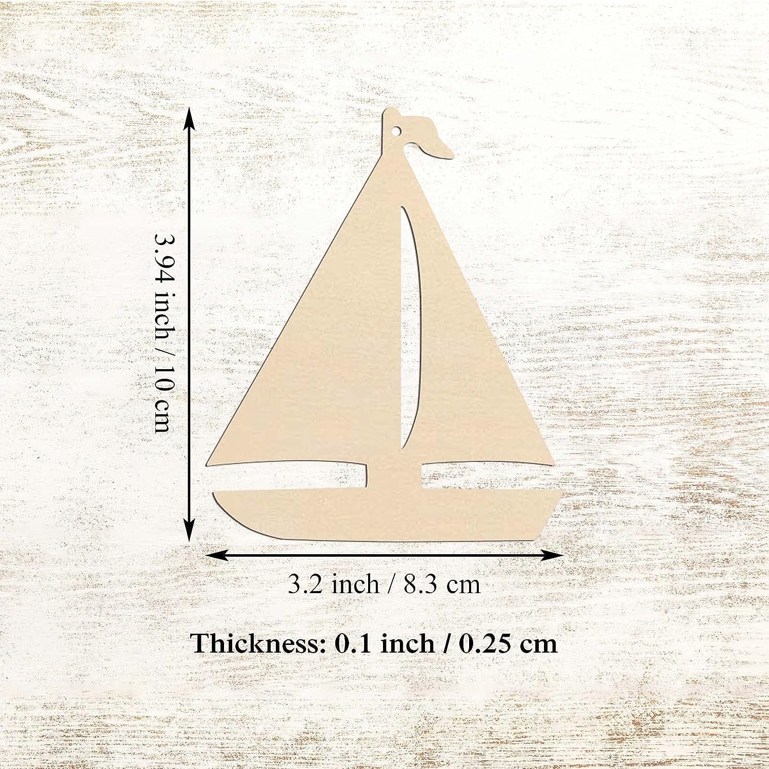 Wooden sailboat cutout with measurements on a textured beige background