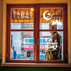 Decorative window with 'Happy Eid' and 'Mubarak' text, showing a person wearing a traditional headscarf.