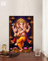 Decorative wall art of Lord Ganesha on a white wall with candles.