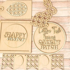 Wooden Easter-themed cutouts with 'Happy Easter' and 'Cotton Tail Farms Carrot Patch' text on a wooden background.
