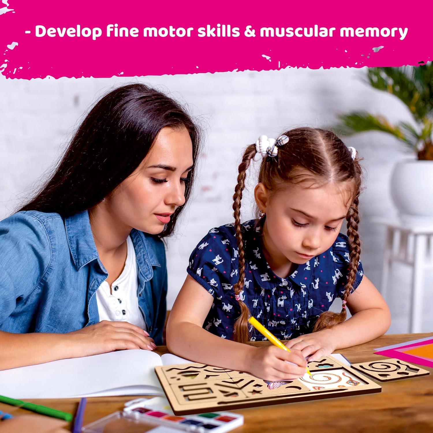 Woman and young girl drawing on paper with text about developing fine motor skills and muscular memory.