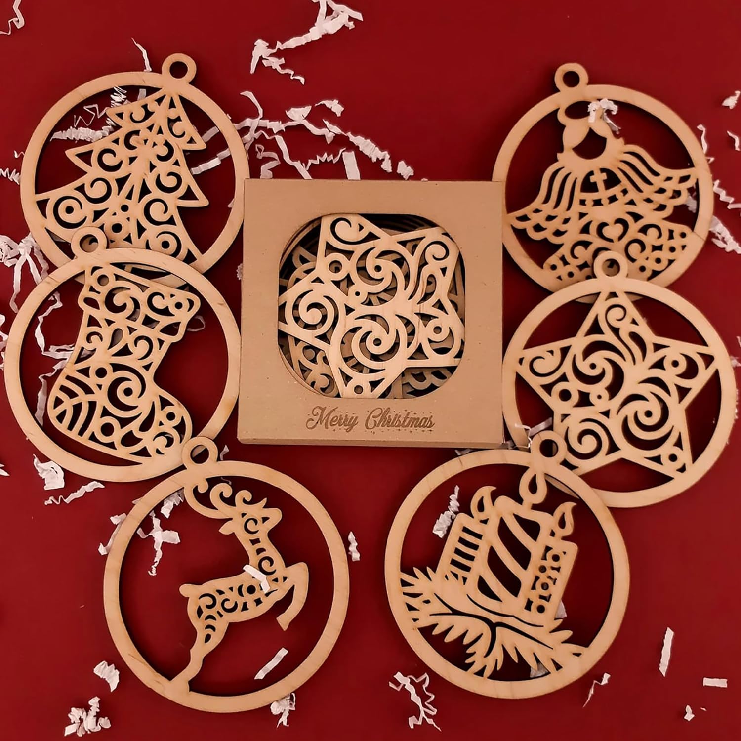 Wooden Christmas ornaments with intricate designs on a red background