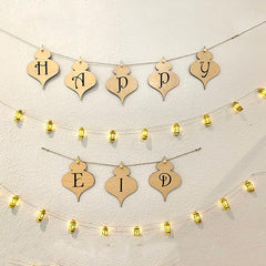 Decorative string banner with 'Happy Eid' on a light background