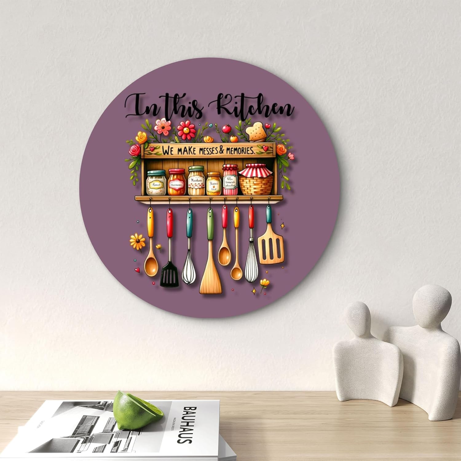 Decorative wall art with kitchen-themed design on a purple background