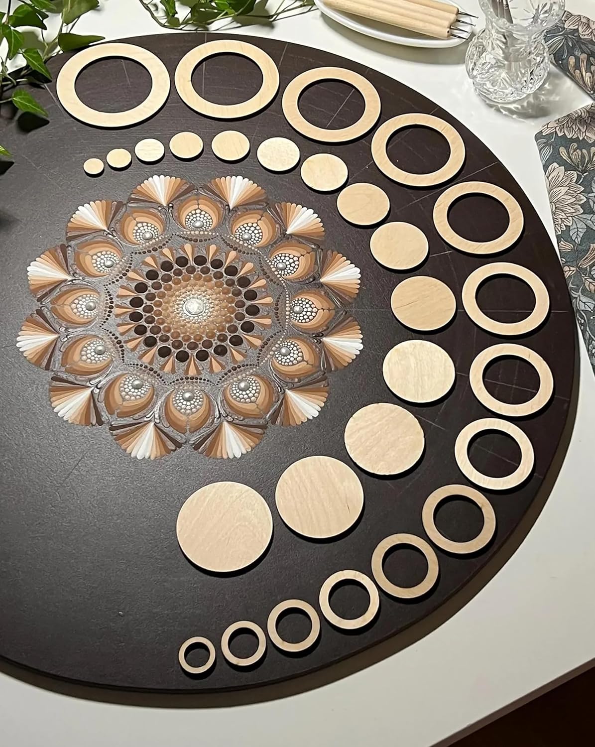 Decorative round mat with geometric patterns on a table