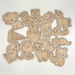 Set of wooden animal-shaped toys on a white background