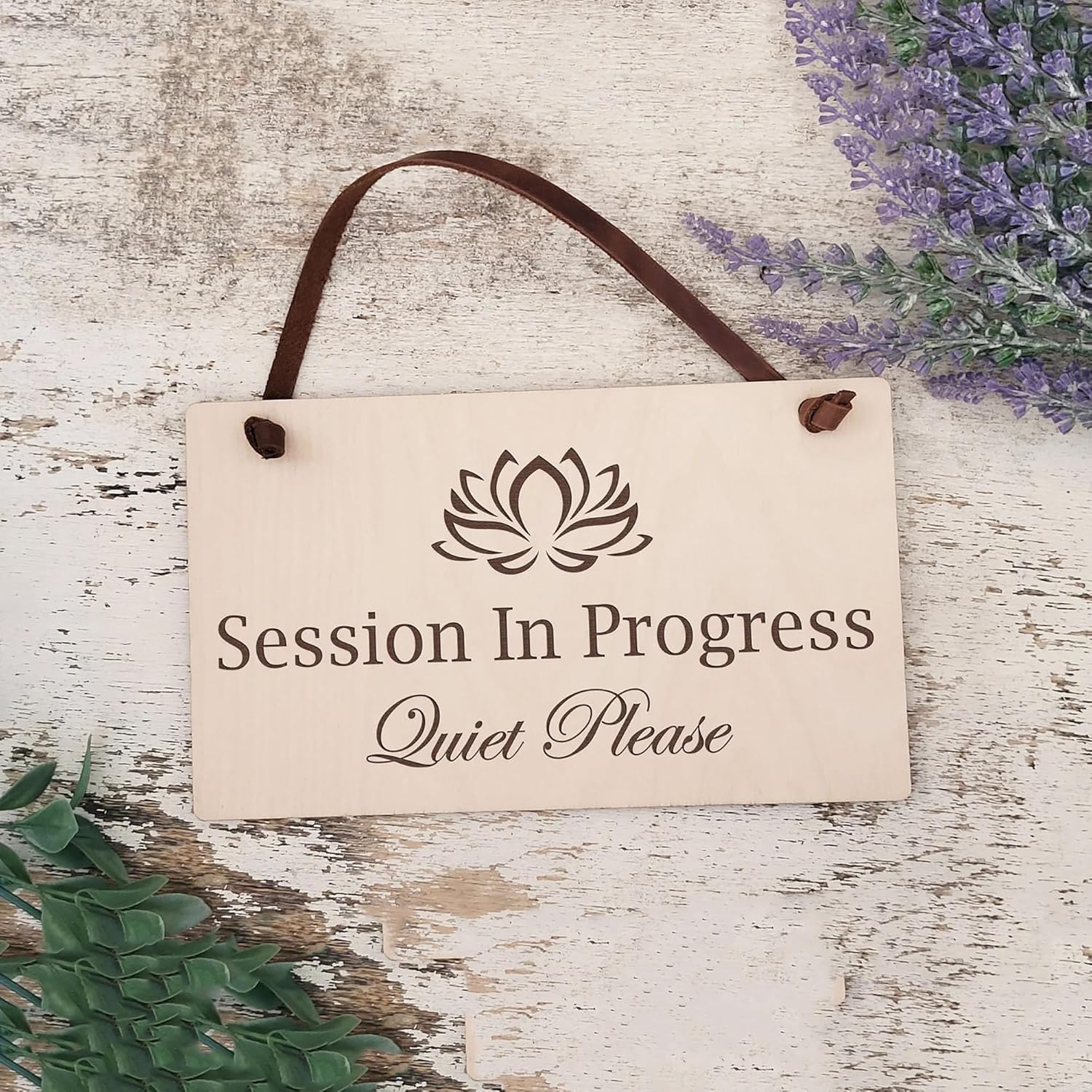 Wooden sign with 'Session In Progress Quiet Please' text and lotus flower symbol on a rustic wooden background.