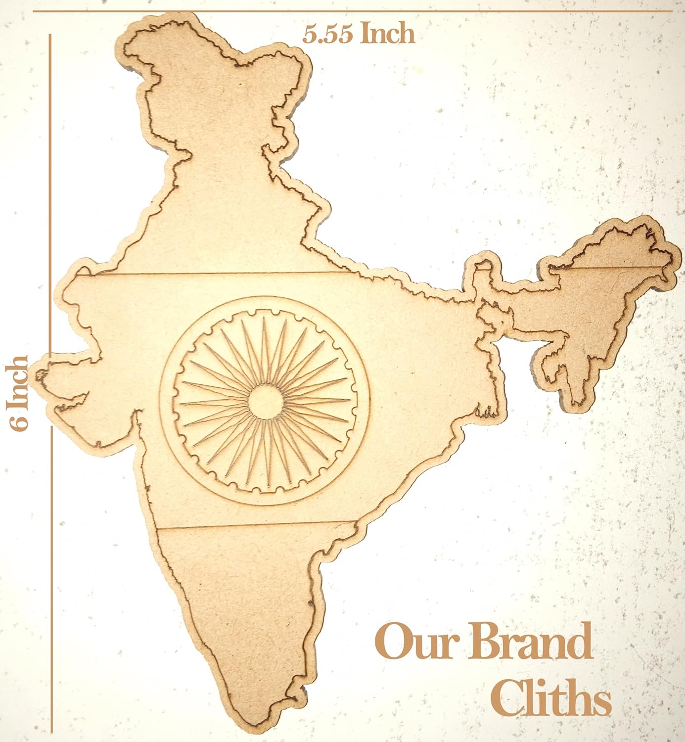 Wooden cutout of a map of India with a brand name on a beige background