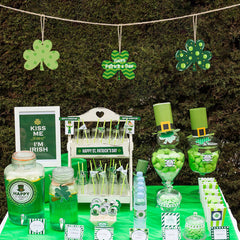 St. Patrick's Day-themed table decorations with green and white elements.