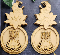 Decorative wooden ornaments with lotus designs and text on a dark background