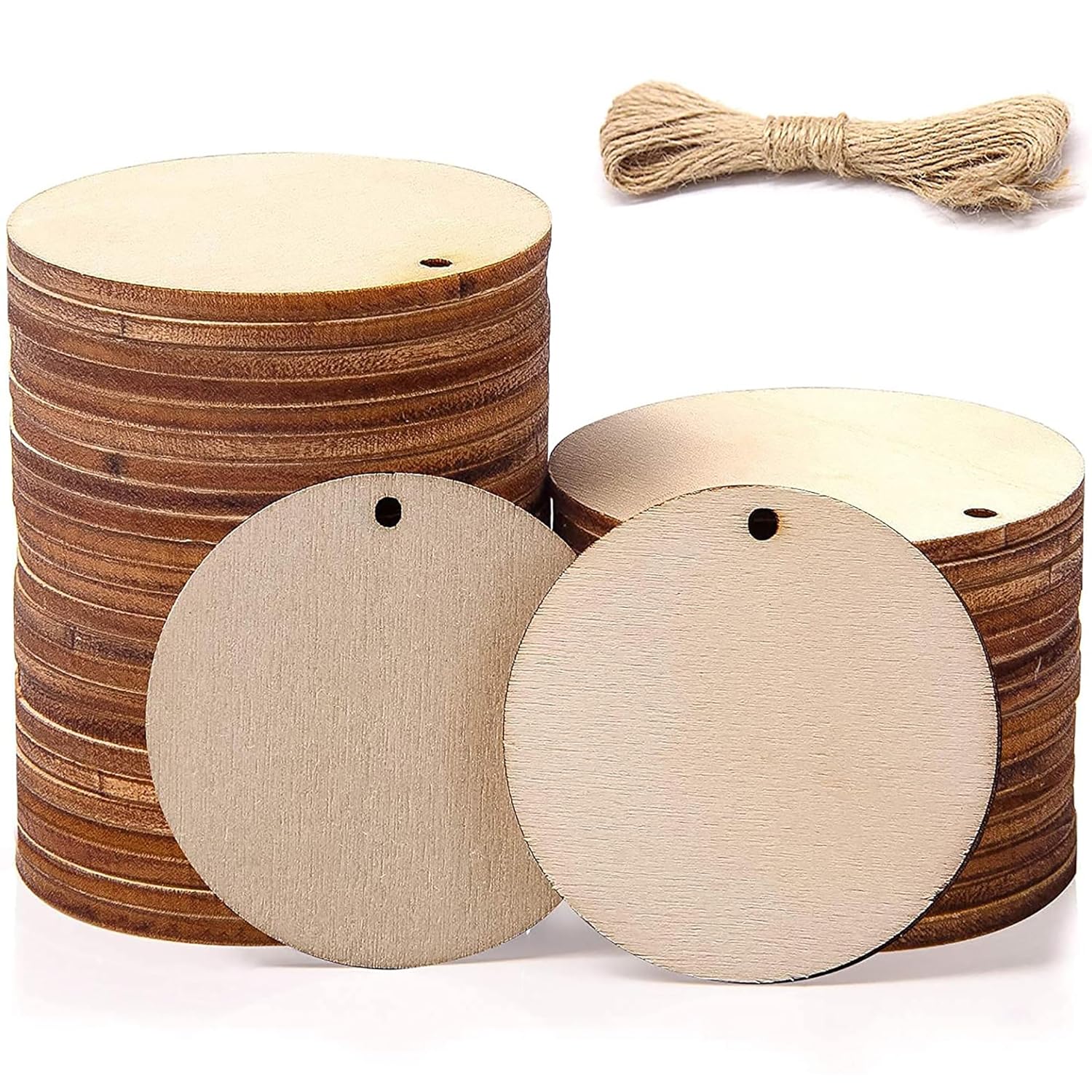 Wooden round tags with string on a white background