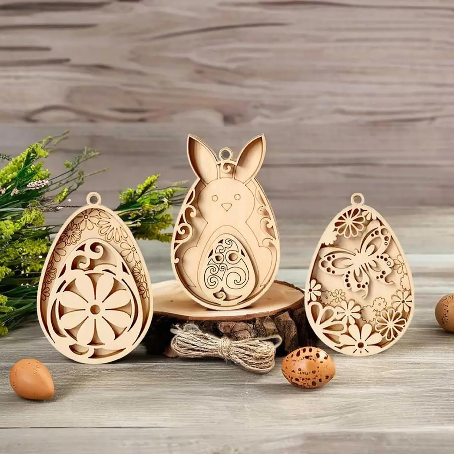 Wooden Easter egg molds with intricate designs on a wooden surface.
