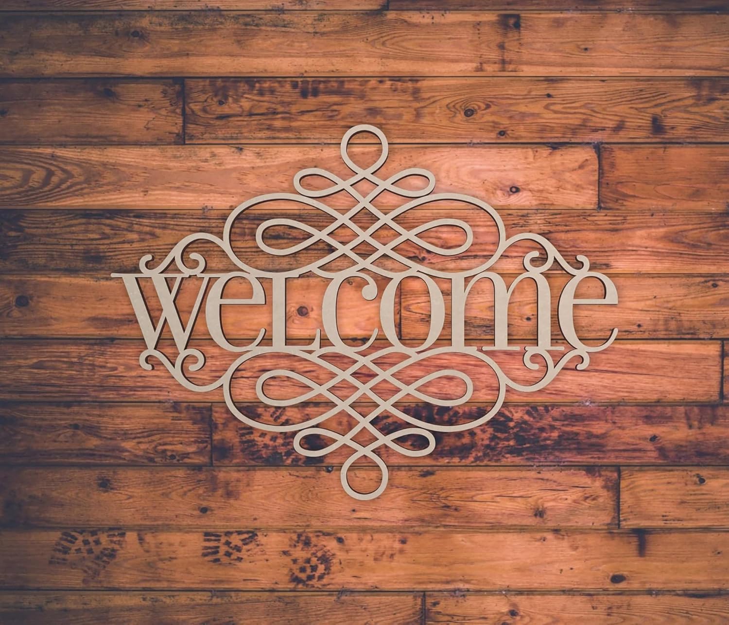 Decorative 'welcome' sign on a wooden wall