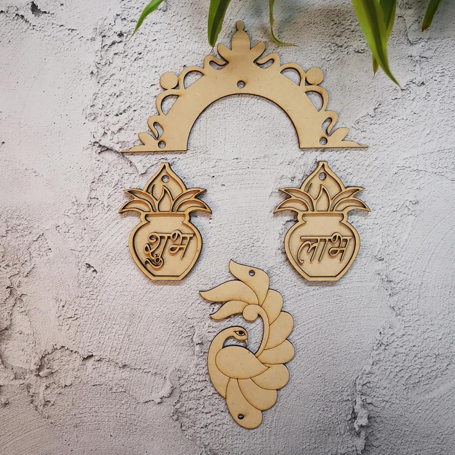 Decorative wooden ornaments with intricate designs on a textured wall.