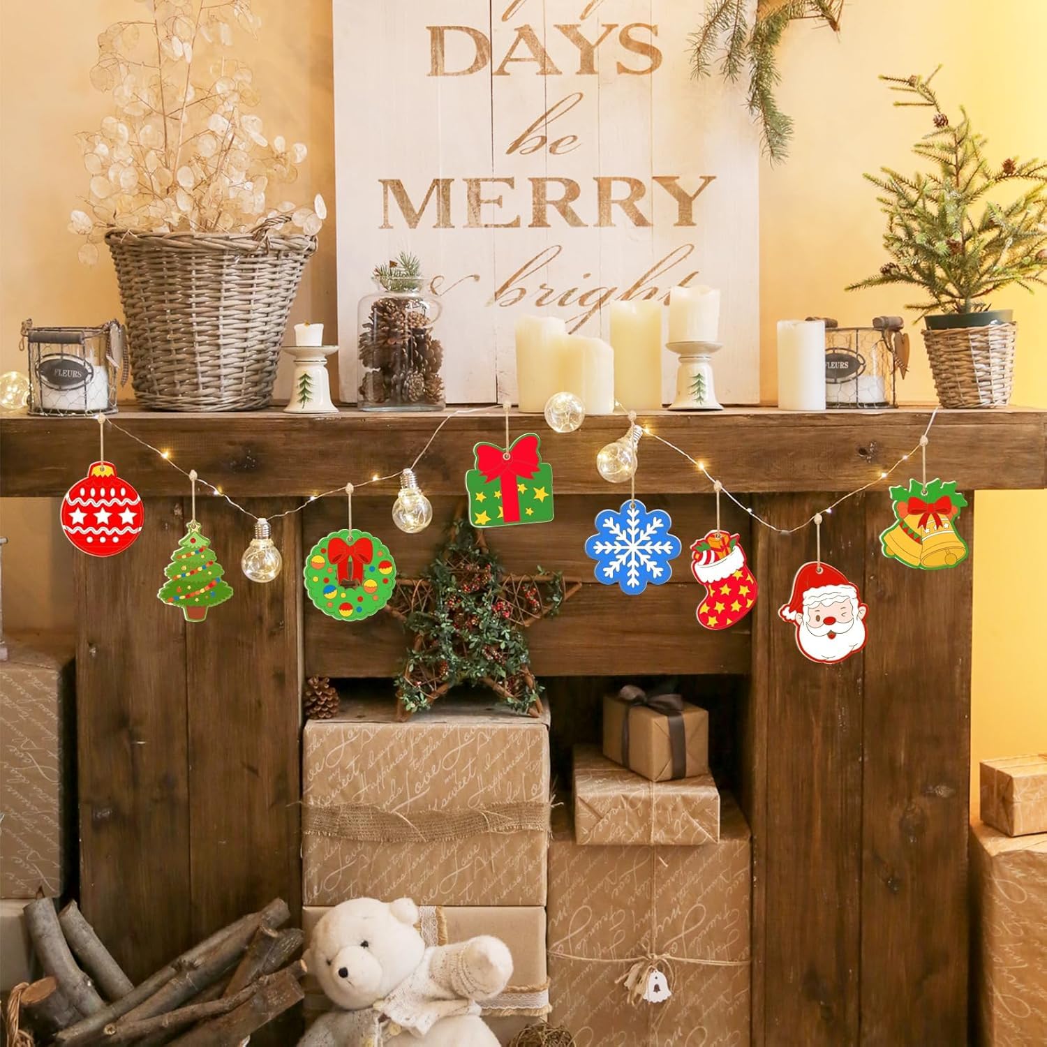 Decorative Christmas mantel with festive ornaments, candles, and a 'Merry' sign.