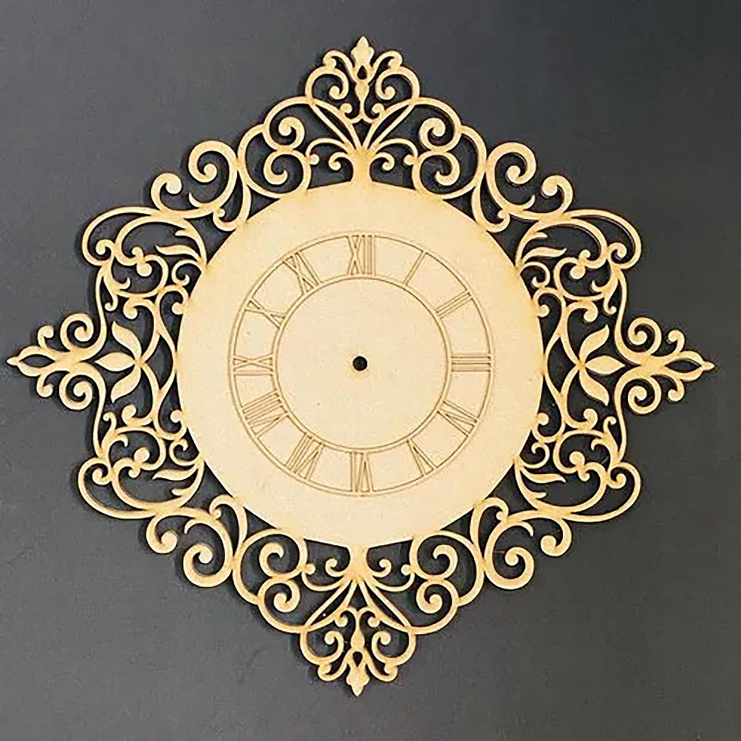 Decorative wall clock with intricate gold design on a dark background