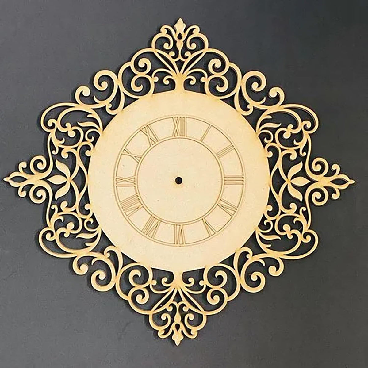 Decorative wall clock with intricate gold design on a dark background
