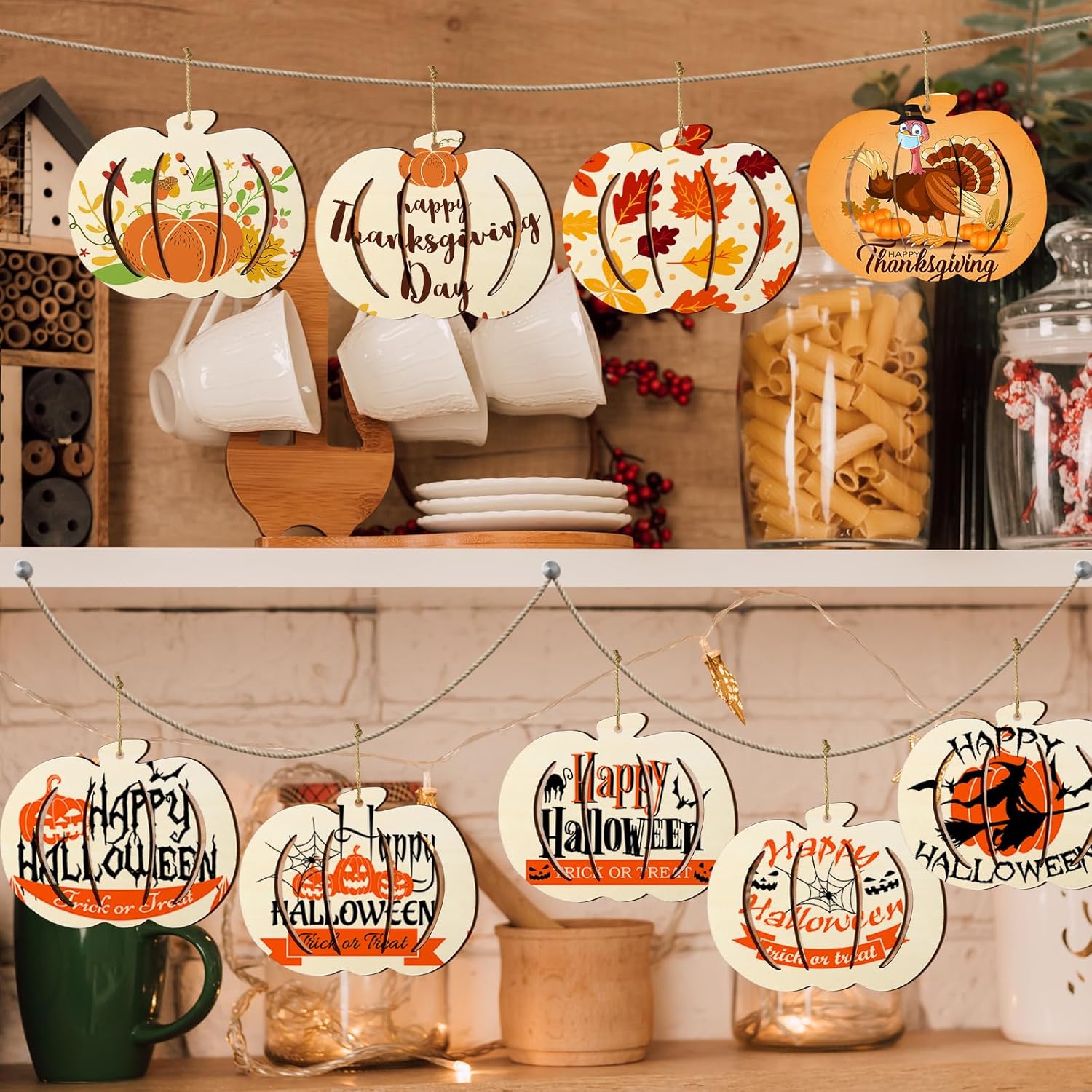 Decorative Halloween and Thanksgiving signs hanging on a shelf with mugs and jars.