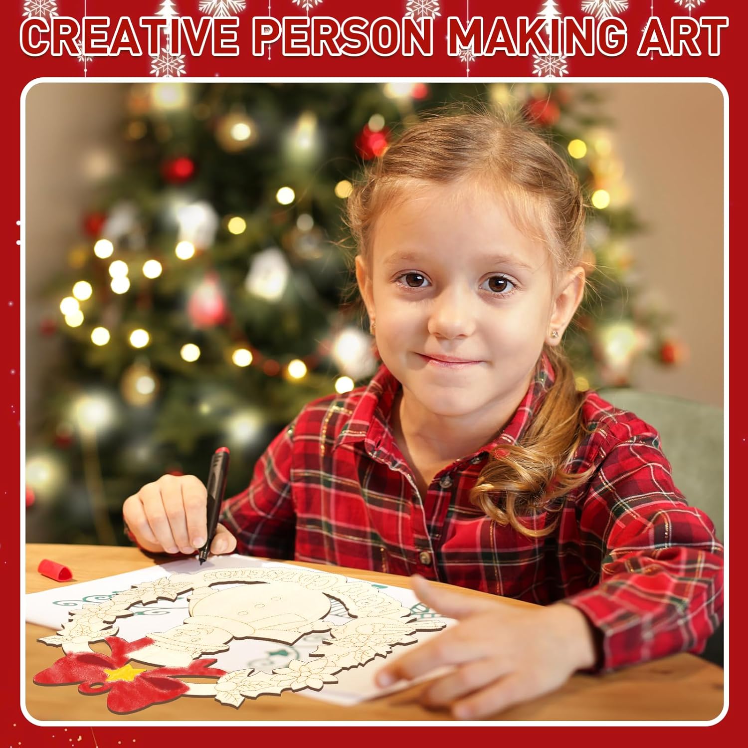 Child in a red plaid shirt coloring a picture with a Christmas tree in the background