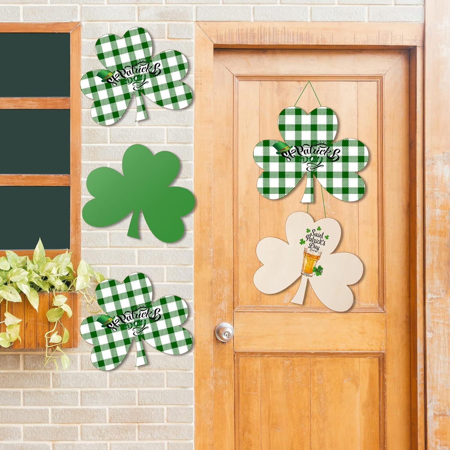 Decorative shamrock signs with checkered patterns and text on a door and wall.