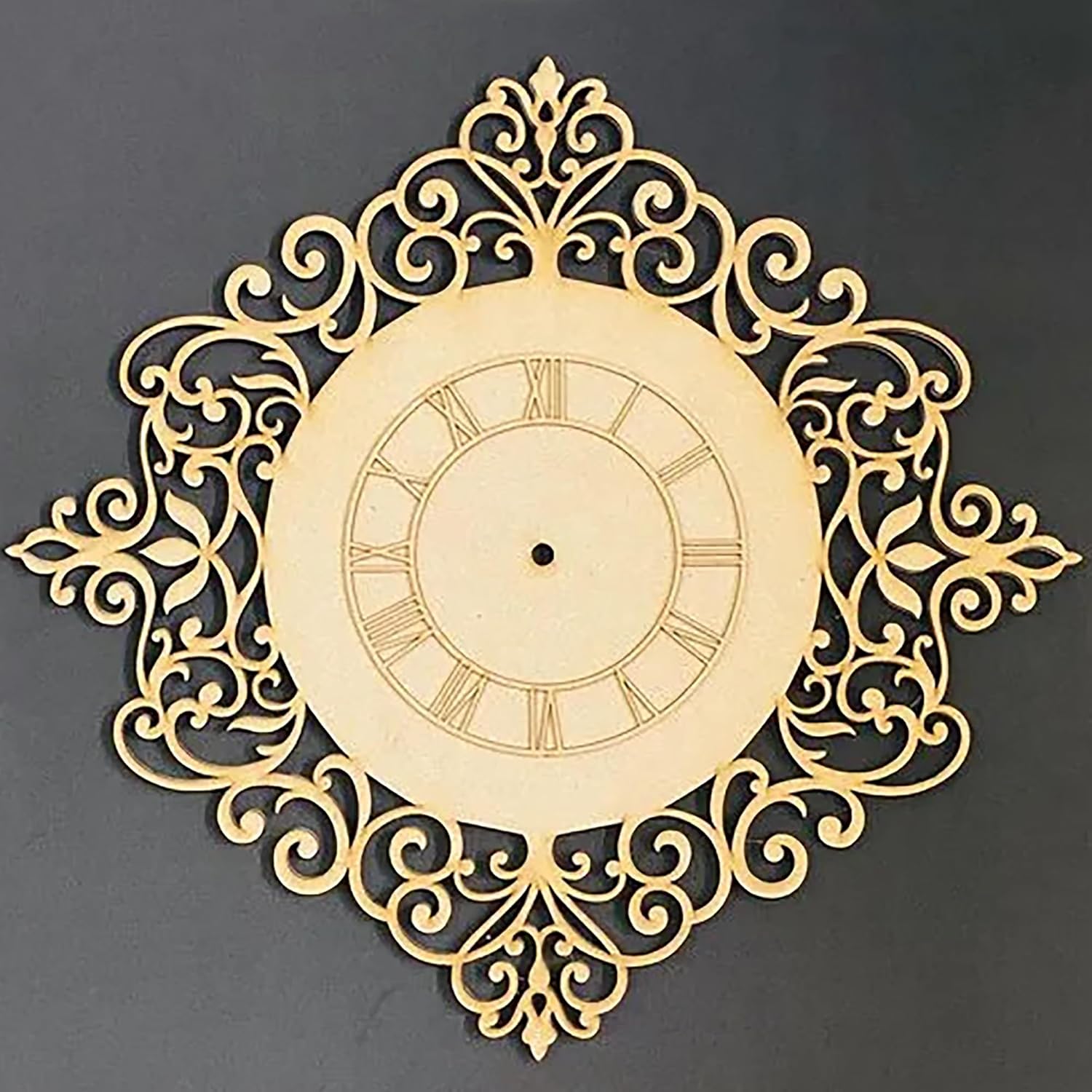 Decorative wall clock with intricate gold design on a black background