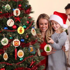 Family by a Christmas tree with decorated ornaments