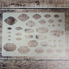 Stencil with geometric shapes on a wooden surface