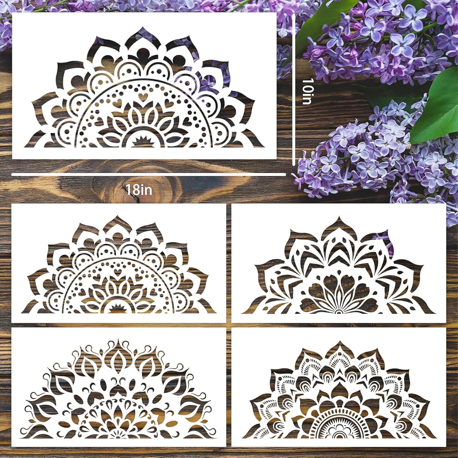 Set of decorative stencils with floral patterns on a wooden surface with purple flowers.