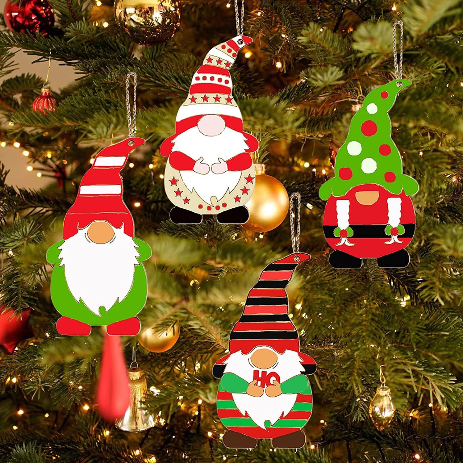 Decorative Christmas gnome ornaments on a tree with lights.