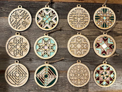 Decorative circular ornaments with geometric patterns on a wooden surface